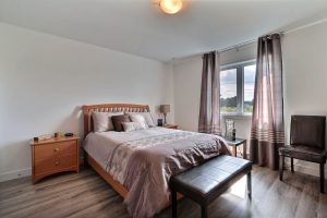 Chambre principale de condo à vendre - Les Jardins d'Anna